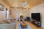 Homey living room featuring a kiva fireplace